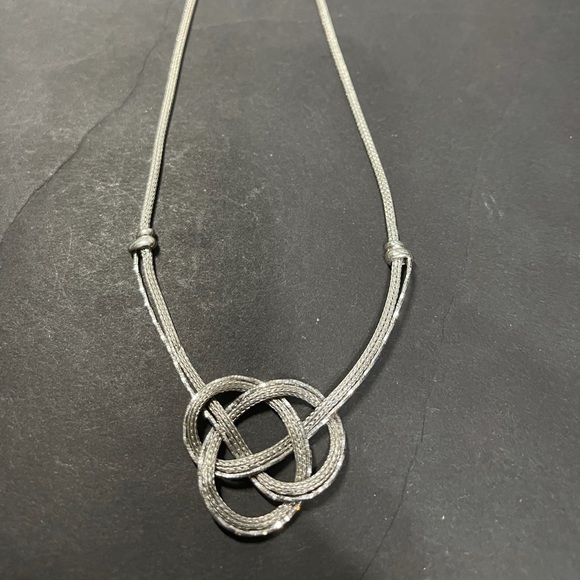 Dyadema Jewelry - Eternity triple knot sterling silver necklace.